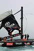 America's Cup Race 4: The mainsail is removed from the boom and the standing section of the mast.