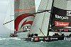 America's Cup Race 4: Team NZ hoists the spinnaker and pursues the Swiss team down the first run.