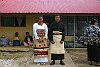 The Kingdom Of Tonga in the South Pacfic <br>Newlyweds stand in front of the family house after Sunday church
