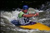 Kayaker flies through the white water section of the rodeo.