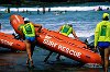 New Zealand surf rescue push away on a west coast beach/New Zealand