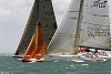 The 180th Skandia Cowes Week Regatta got underway today amidst changing conditions as an occluded front swept eastwards across the British Isles testing the record fleet of 1,028 yachts across some 37 classes. <br>Fleets overlap: Ker 46 Fair Do's VII, Squib Pure Genius and IMX45 Exabyte<br>Paul Todd/outsideimages.co.nz<br><br>*******Editorial Use Only********<br><br>