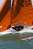 The 180th Skandia Cowes Week Regatta got underway today amidst changing conditions as an occluded front swept eastwards across the British Isles testing the record fleet of 1,028 yachts across some 37 classes. <br>Squib Pure Genius<br>Paul Todd/outsideimages.co.nz<br><br>*******Editorial Use Only********<br><br>